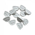 Twelve light gray pug-shaped wax melts arranged on a plain white background, with small descriptive text printed above them.
