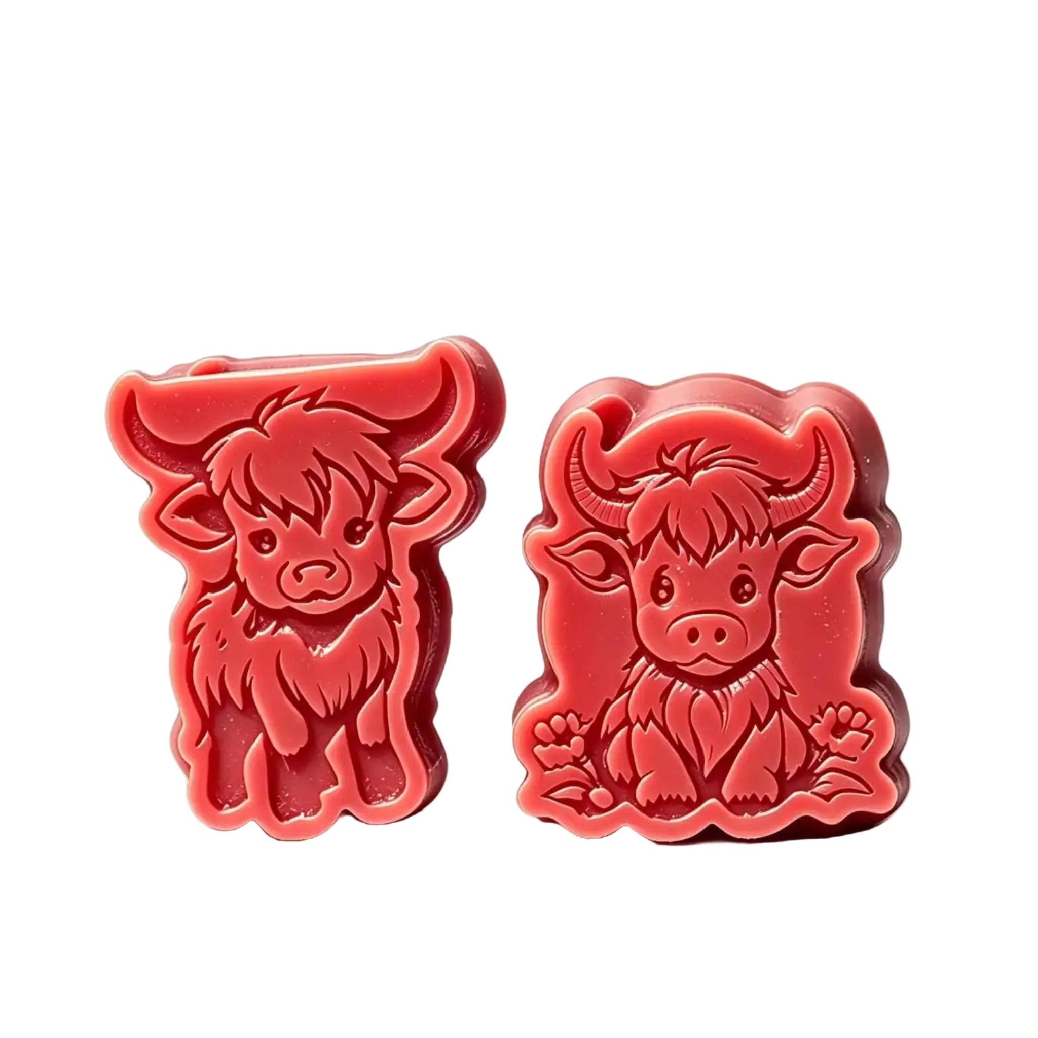 Two red cow-shaped wax melts or soap bars shown on a white background with black letterboxing and a text overlay describing dimensions and wax holding capacity.