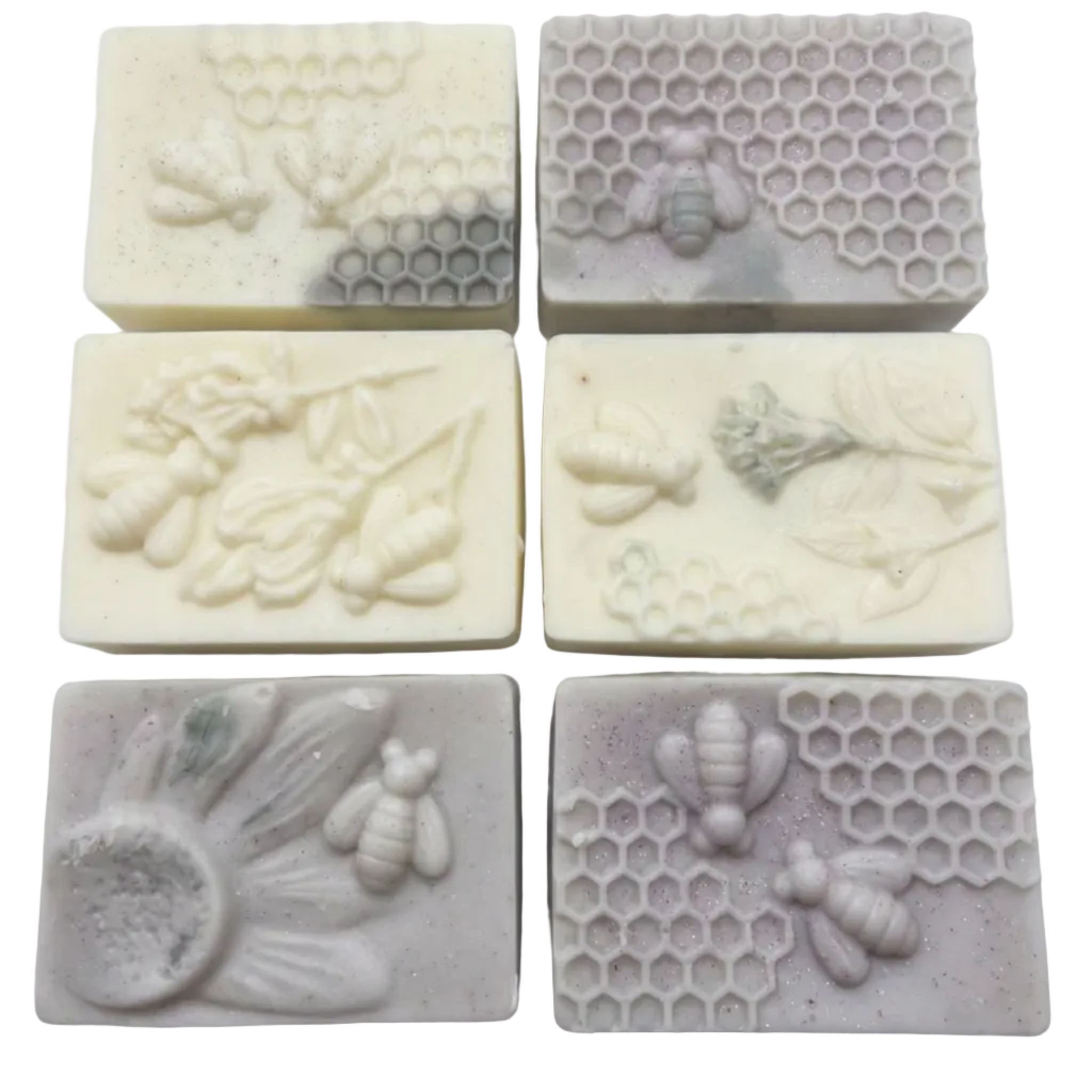 Six rectangular handmadewax melts arranged in a 2x3 grid on a plain white background. The soaps feature embossed floral, bee, and honeycomb designs.
