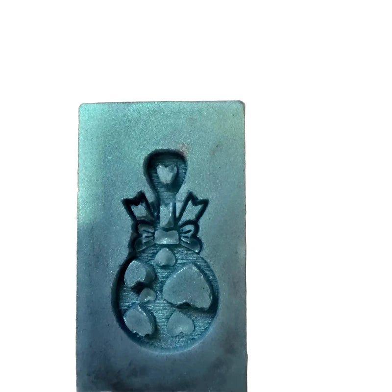 A rectangular wax melt  with a recessed pineapple design, shown against a plain white background.