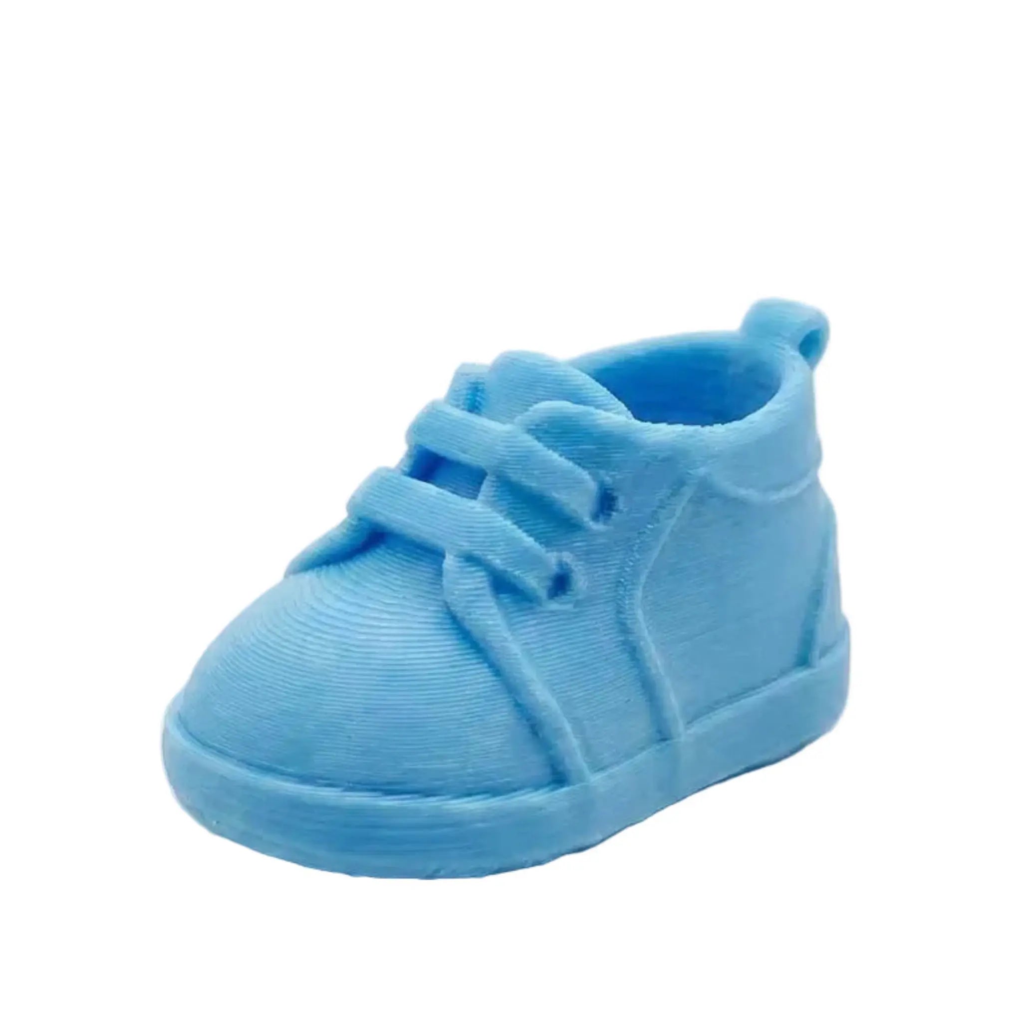A single light blue baby sneaker  WAX MELT with a textured fabric upper, matching laces, and a flexible sole, shown on a plain white background.