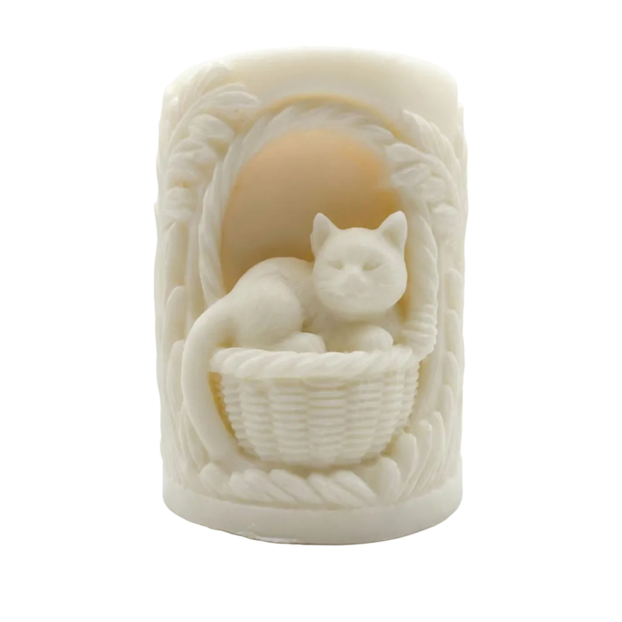 An off-white ceramic candle featuring a sculpted white cat resting in a woven basket, set against a plain white background.