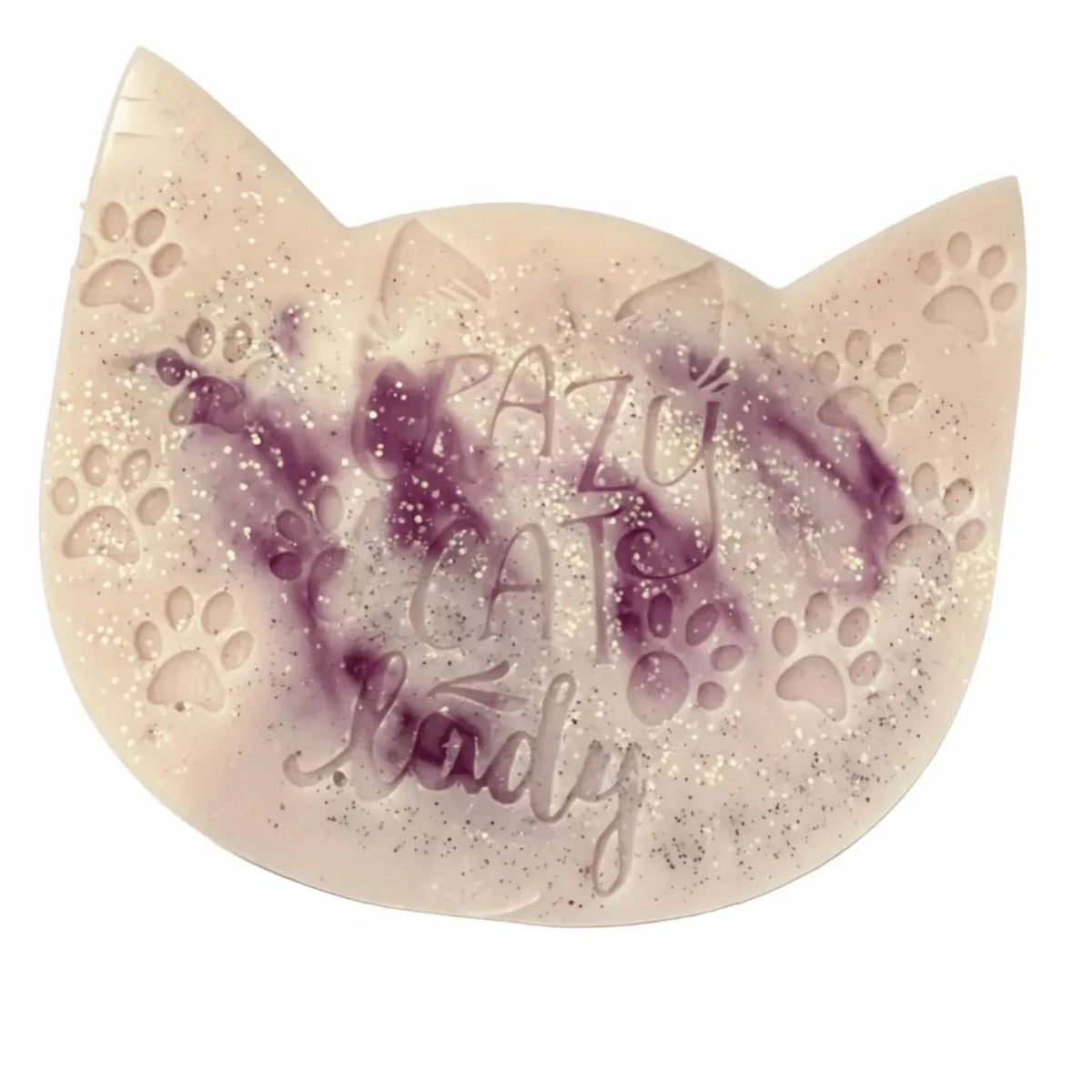 A crescent-shaped cat-shaped wax melt with a light beige base, embedded with purple glitter swirls, paw prints, and fine silver glitter. The words 'CAZU CAT Lady' are embossed on the front.