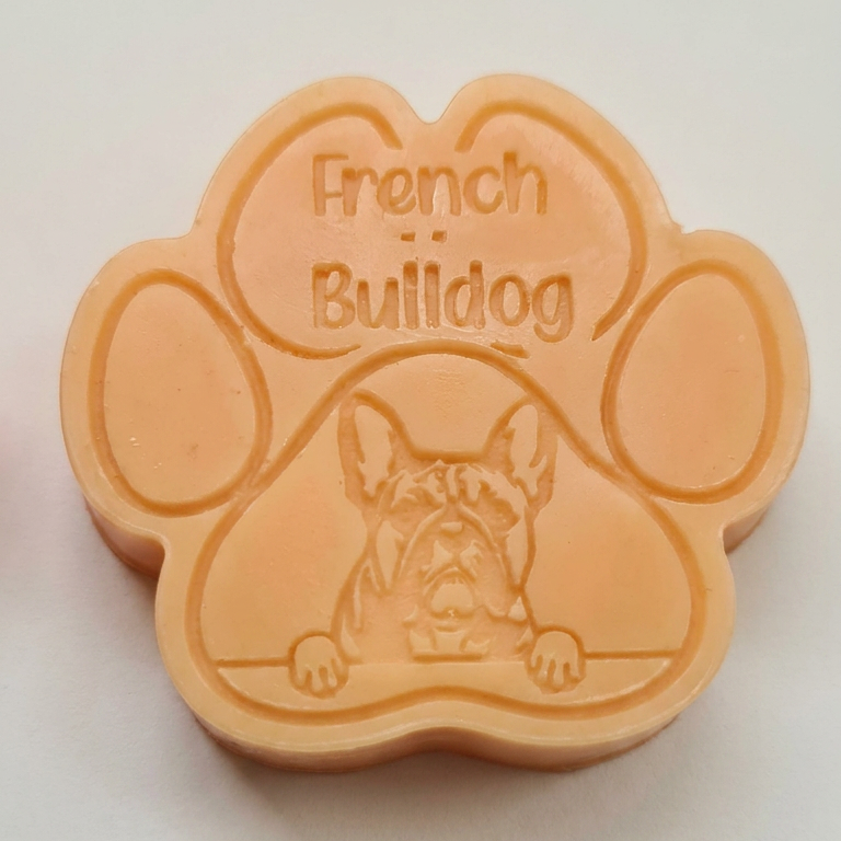 Paw-shaped Wax melt with 'French Bulldog' text on a light background