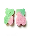Two teddy bear-shaped WAX MELT  on a white background, one with a green-to-pink gradient and the other with a pink-to-green gradient, both featuring the text 'Get well soon' on the front.