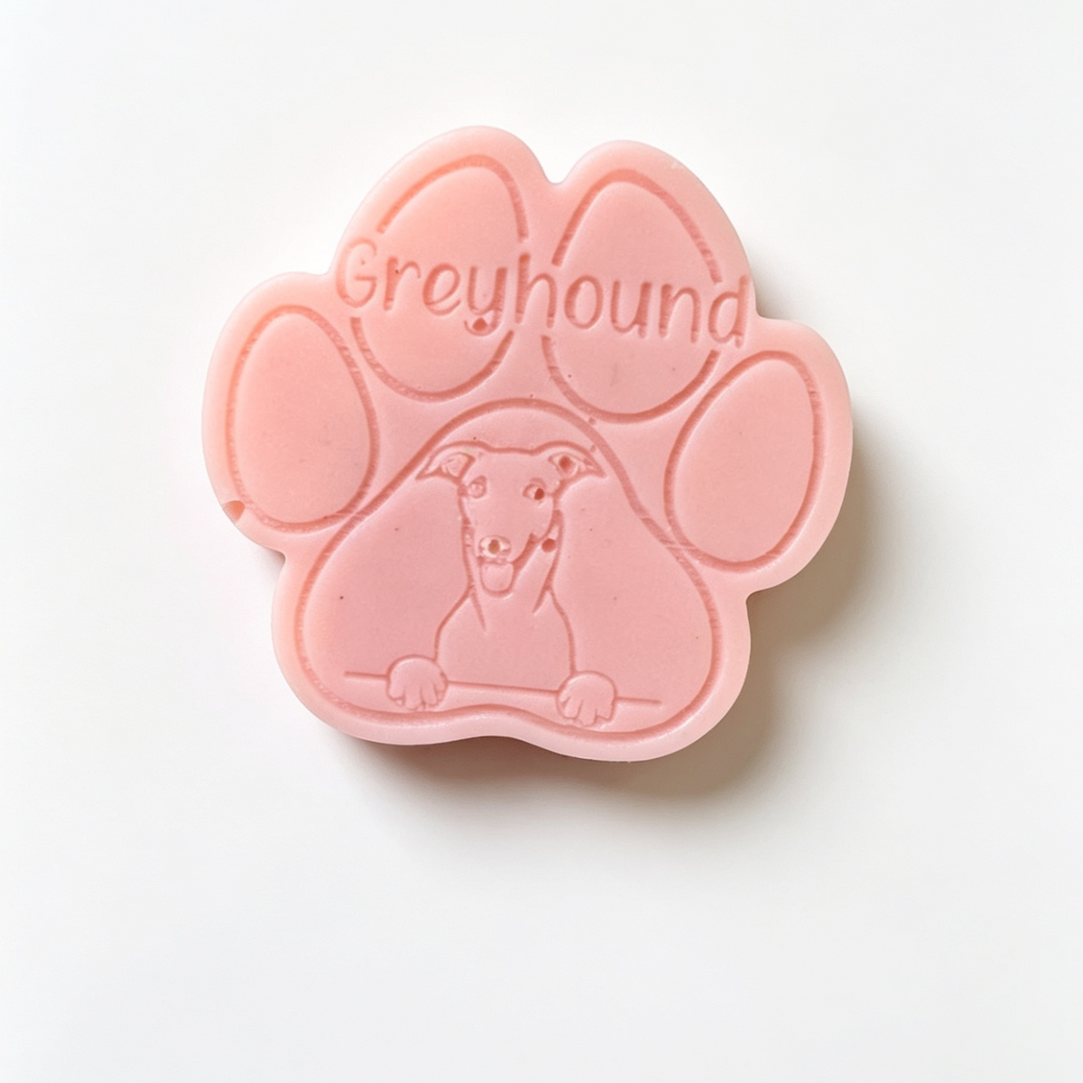 Pink paw-shaped Greyhbound with 'Greyhound' text on a white background