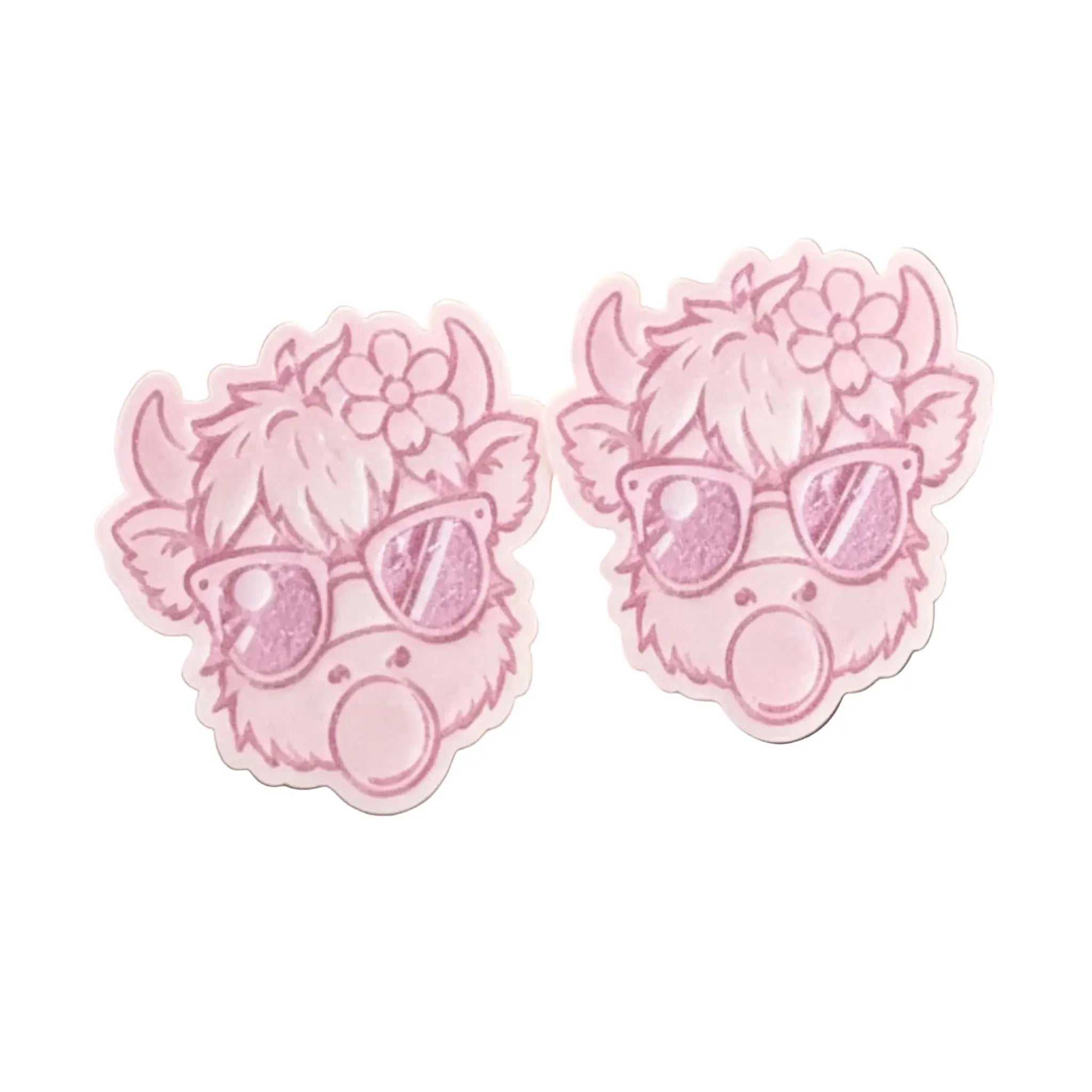 Two pink cartoon cow-shaped stickers with sunglasses and flower crowns on a plain white background. WAX MELT