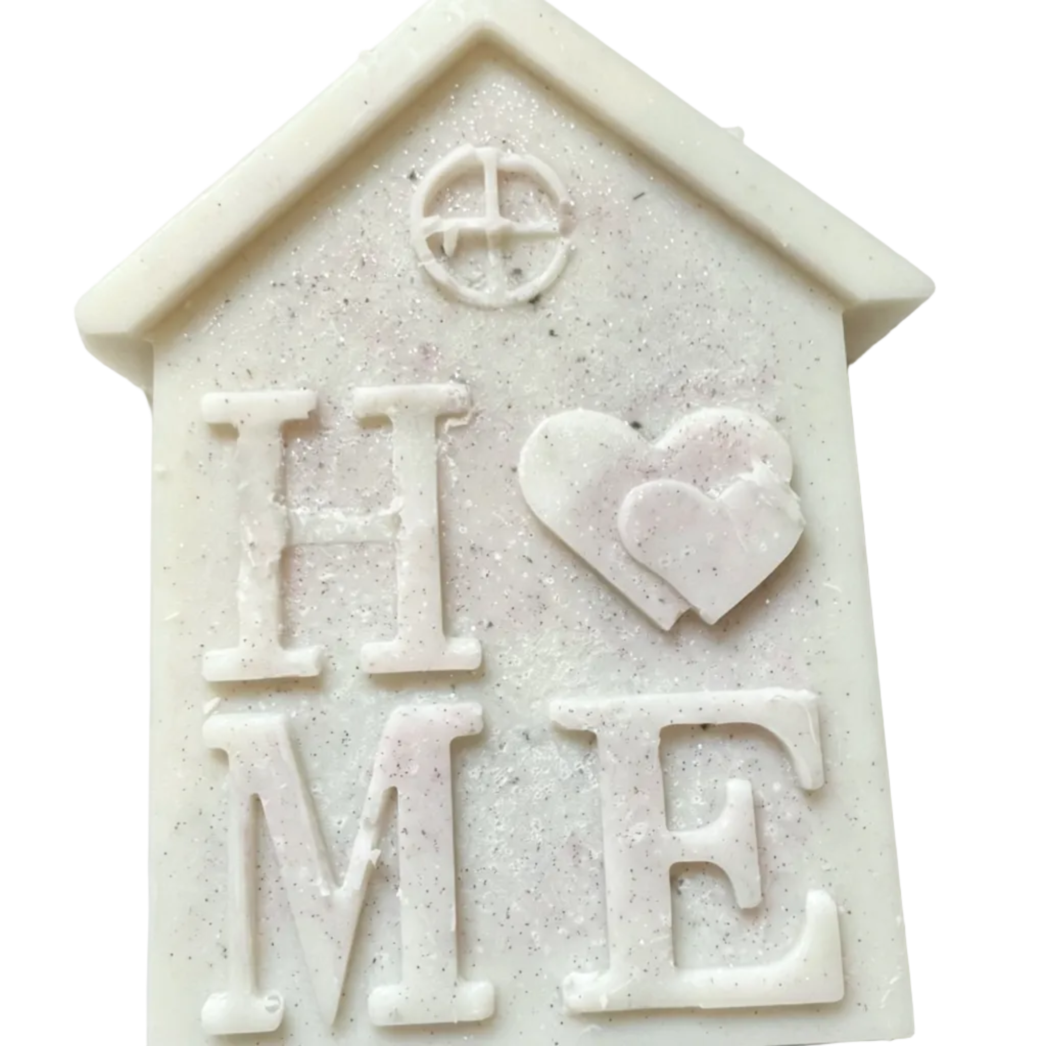 An off-white, house-shaped decorative CANDLE/WAX MELT  featuring the word 'HOME' with a heart symbol, set against a plain white background.