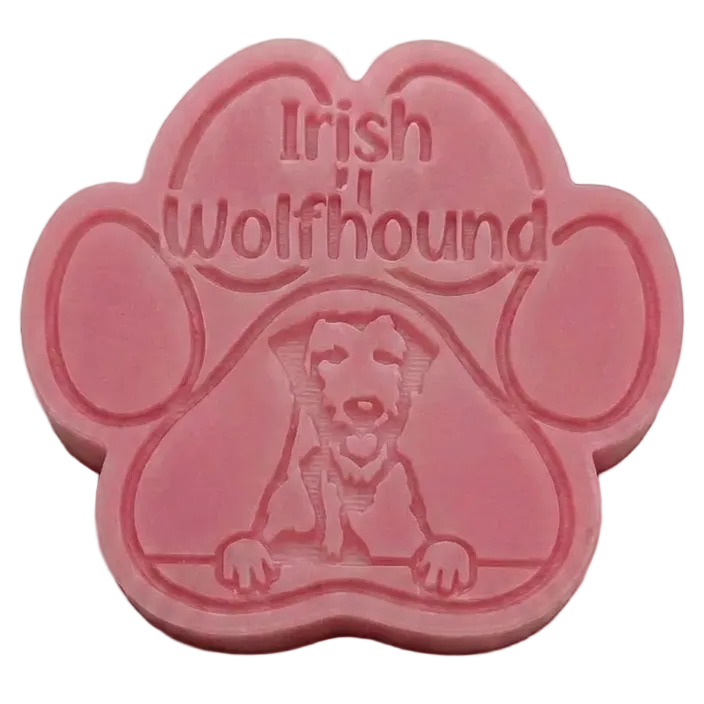 A pink paw-shaped wax melt featuring an embossed Irish Wolfhound dog illustration and the text 'Irish Wolfhound' on the top, set against a plain light background.