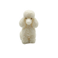 A small sculpted poodle CANDLE  in an off-white or ivory tone, photographed against a seamless light gray studio background.