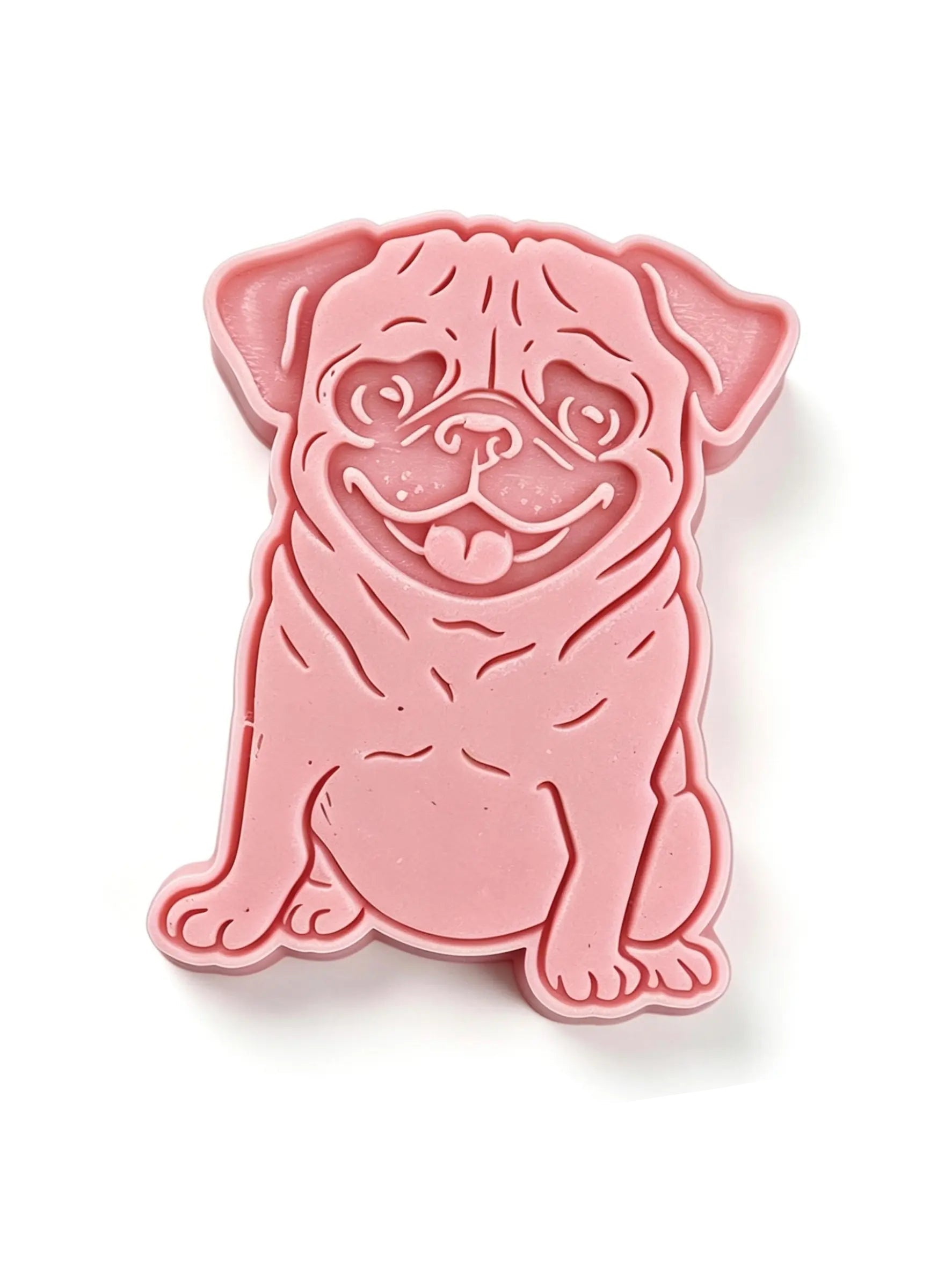 Handmade pug-shaped wax melt, hand-poured in Yorkshire with your choice of fragrance. Paws-itively perfect for pug parents.