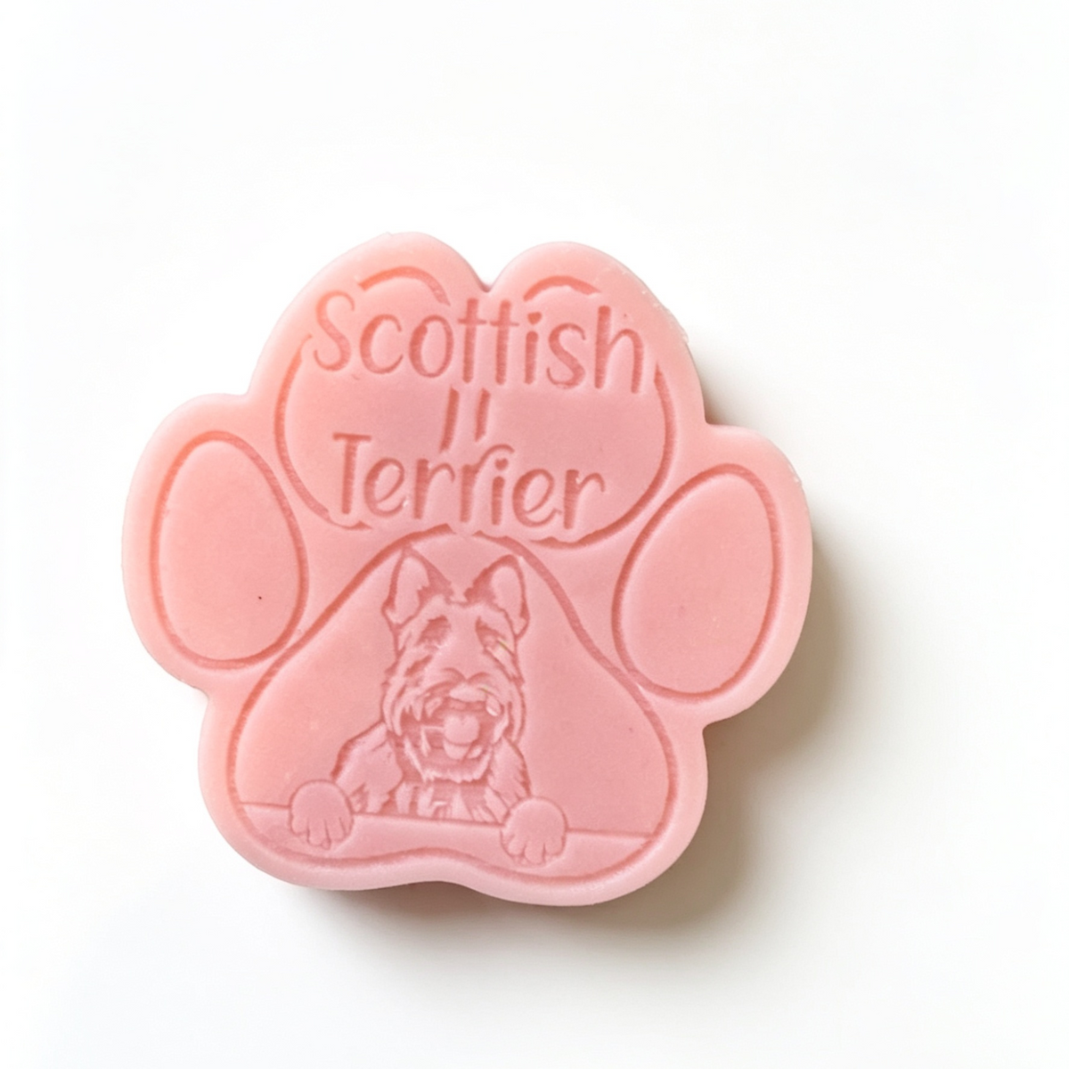 Pink paw-shaped wax melt with 'Scottish Terrier' text on a white background