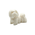 A small white CANDLE of a fluffy dog, likely made of resin or ceramic, shown on a seamless white background. OF SHIH TZU