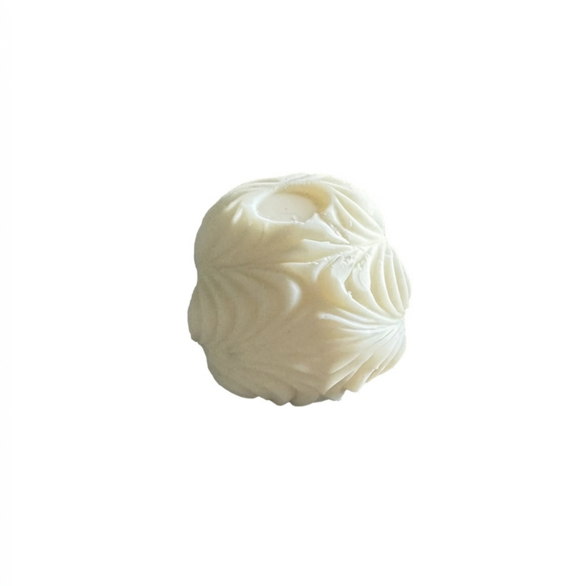 A single cream-colored, intricately carved decorative candle shown on a plain white background.