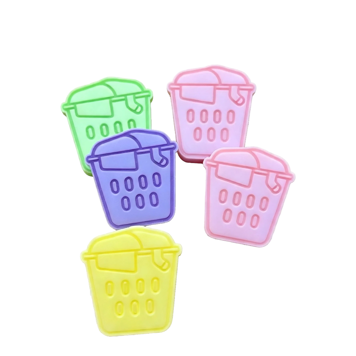 Five small basket-shaped accessories in pastel colors including green, purple, pink, and yellow, arranged on a transparent checkerboard background. A small ' watermark appears in the bottom right corner.