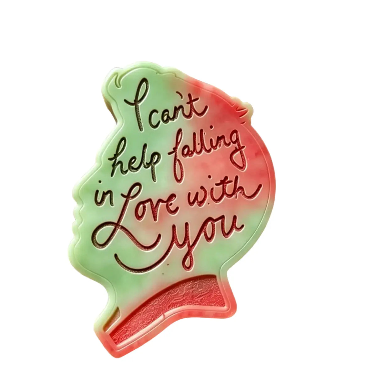 wax melt profile silhouette, featuring a green and pink gradient design with the text 'I can't help falling in love with you' in dark red cursive lettering, shown on a plain white background.